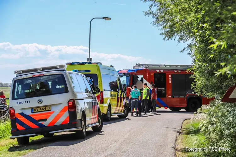 Man met scootmobiel te water aan de Hippolytushoeverkruisweg